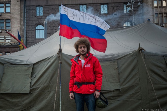 Media tent on Maidan. Photographer Ilya Varlamov planted a Russian flag inscribed "I am Maidan." height=439